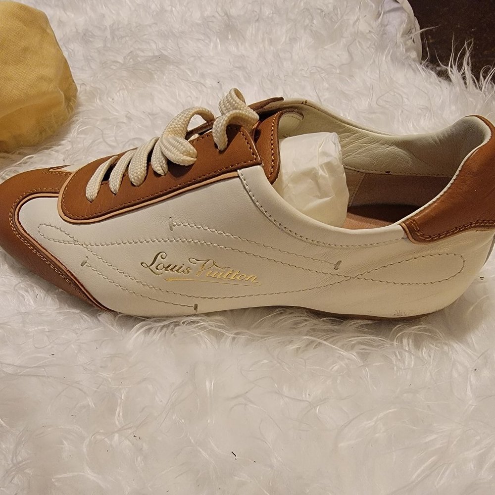 Never worn Louis vuitton shoes with original dust bag and box.